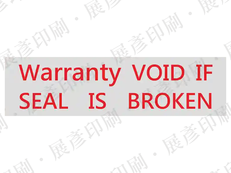 銀底紅字，文字「Warranty VOID IF SEAL IS BROKEN」。用途：防拆保固標示。語系：英文