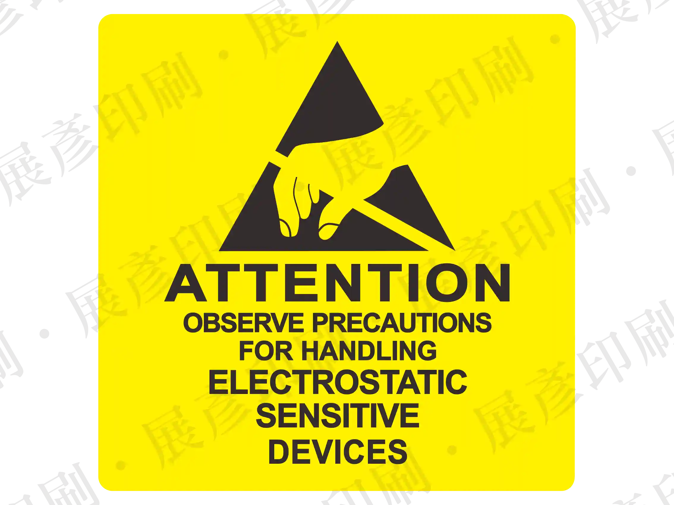 黃色正方形底,黑色ESD防靜電三角標誌(手部與三角形),下方文字「ATTENTION OBSERVE PRECAUTIONS FOR HANDLING ELECTROSTATIC SENSITIVE DEVICES」。用途:靜電敏感元件警示。語系:英文