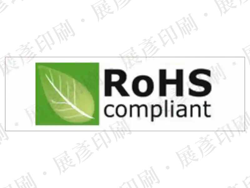 白底，左側綠色葉片圖案，右側黑色文字「RoHS compliant」。用途：符合RoHS規範標示。語系：英文